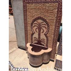 Fontaine terre cuite palmier